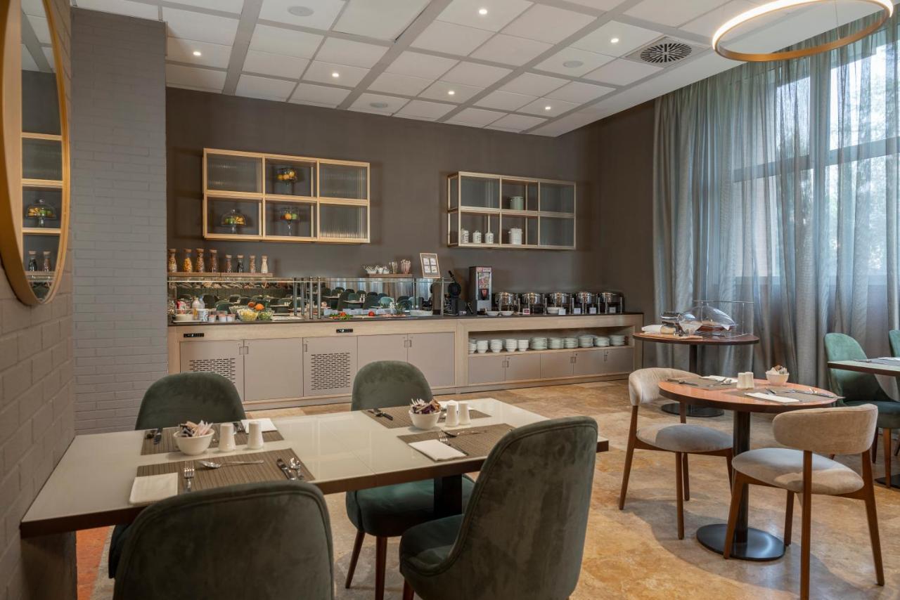 Quarto Inferiore Hilton Garden Inn Bologna North מראה חיצוני תמונה